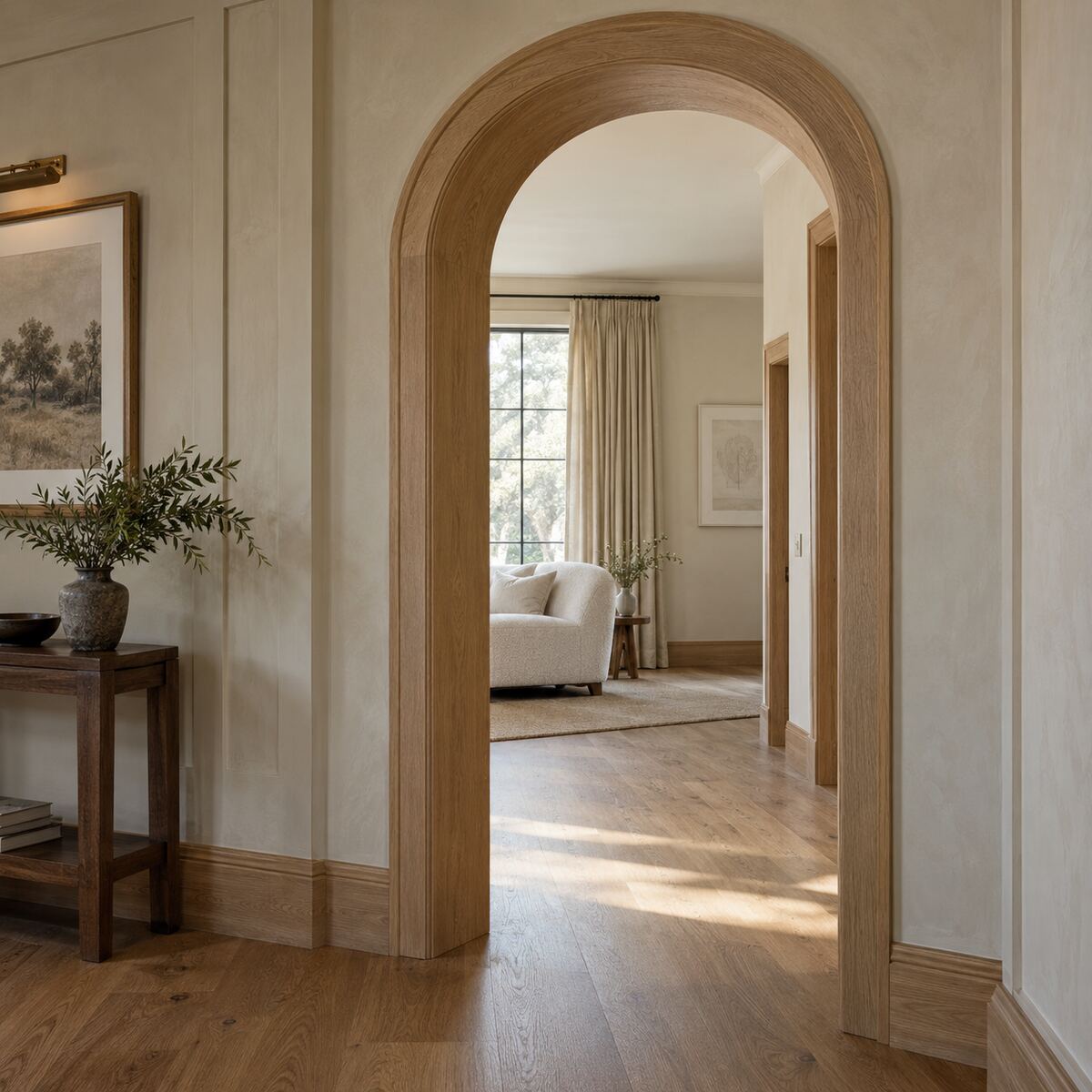 Custom arched oak casing carpentry example